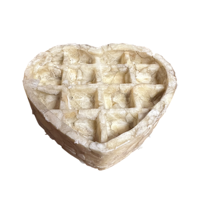 Heart-shaped Anco Naturals Buffalo Collagen Waffle Heart with star patterns on a white background