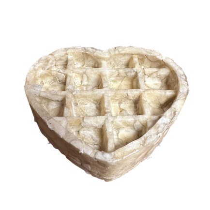 Heart-shaped Anco Naturals Buffalo Collagen Waffle Heart with star patterns on a white background