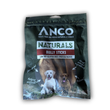 Load image into Gallery viewer, A bag of ANCO Naturals Bully Sticks dog treats, featuring a dark green packaging design with images of two dogs and text highlighting natural ingredients and air-drying.
