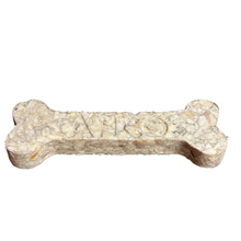 Load image into Gallery viewer, Bone-shaped pet treat with &#39;NATRUE&#39; branding on a white background

