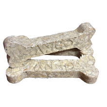 Load image into Gallery viewer, Two bone-shaped dog treats on a white background
