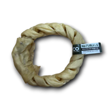 Load image into Gallery viewer, A natural braided dog chew ring with a black and white tag reading 'NATURALS' and 'CO', shown on a white background with a soft drop shadow.
