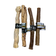 Load image into Gallery viewer, Four dog chew toys with 'Naturals' labels on a white sheet of paper.

