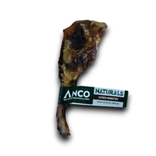 Load image into Gallery viewer, A smoked bone snack with a dark green and white Anco Naturals wrapper, isolated on a white background with a drop shadow.
