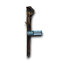 Load image into Gallery viewer, A natural dog chew bone, specifically a German Wolfsang Rindenbiss bone, with a paper label reading 'ANCO NATURALS' wrapped around the middle, set against a plain white background with a drop shadow.
