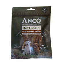Load image into Gallery viewer, Anco Naturals Ostrich Smokey Tendons dog treats in a dark olive green resealable pouch, featuring a white Labrador and a brown dog on the front packaging.
