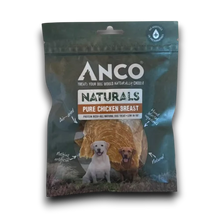 Load image into Gallery viewer, Anco Naturals Pure Chicken Breast dog treat pouch, featuring a dark teal-green background with white and brown branding, and images of two dogs on the front.

