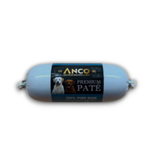Load image into Gallery viewer, A single Anco Premium Pate dog food sausage on a plain white background. The sausage is wrapped in a light blue-gray plastic casing with a dark blue and black label featuring the Anco brand name, images of a white Labrador and a brown dog, and the text 'PREMIUM PATE' and '100% PURE DUCK'.

