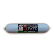 Load image into Gallery viewer, A light blue cylindrical package of Premium Pate 100% Pure Lamb dog food, featuring a central label with pictures of two dogs and product text, set against a plain white background.
