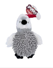 Load image into Gallery viewer, A gray and white penguin-shaped pet toy with black feet and a red Santa hat, shown on a plain white background with its retail tag attached.
