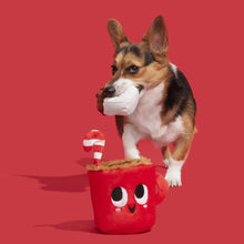 Load image into Gallery viewer, Dog playing with a red mug toy on a red background
