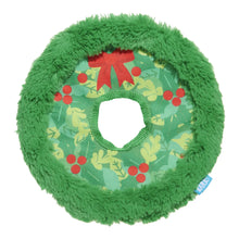 Load image into Gallery viewer, A green plush dog toy shaped like a Christmas wreath, featuring a patterned center with red berries, green leaves, and a red bow, on a white background.
