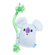 Load image into Gallery viewer, A light blue koala plush dog toy with a green braided rope toy attached, shown on a plain white background. The koala has a purple nose, black embroidered eyes and mouth, and a small blue tag that reads 'BARK'.
