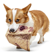 Load image into Gallery viewer, Corgi holding a vintage-style map toy on a white background
