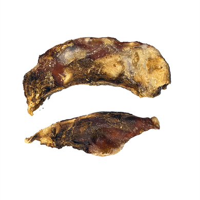 Two dried beef moon bones against a white background, intended as a natural dog treat.