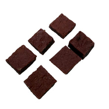Load image into Gallery viewer, Six square pieces of Beef &amp; Beef-Heart Bites 100g on a light gray surface
