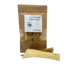 Load image into Gallery viewer, Kraft paper packaging of beef muscle chews for dogs with a single chew stick in front on a white background.
