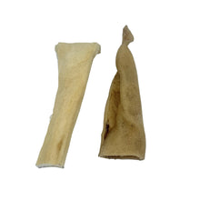 Load image into Gallery viewer, Two pieces of Beef Muscle Chews on a white background
