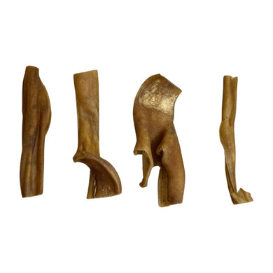 A selection of buffalo skin treats in various shapes and sizes for dogs.