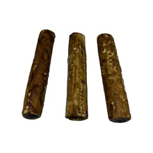 Load image into Gallery viewer, Three cylindrical brown dog chew Buffalo Collagen Rolls on a white background
