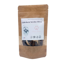 Load image into Gallery viewer, Brown package of dog treats with a label on a white background
