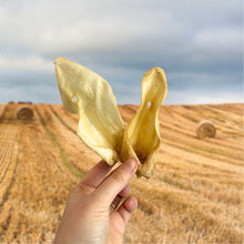 Load image into Gallery viewer, hand holding two goat ears
