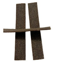 Load image into Gallery viewer, Two brown Goat Jerky Bar strips on a white background
