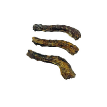 Load image into Gallery viewer, Three dried animal treats on a light blue background
