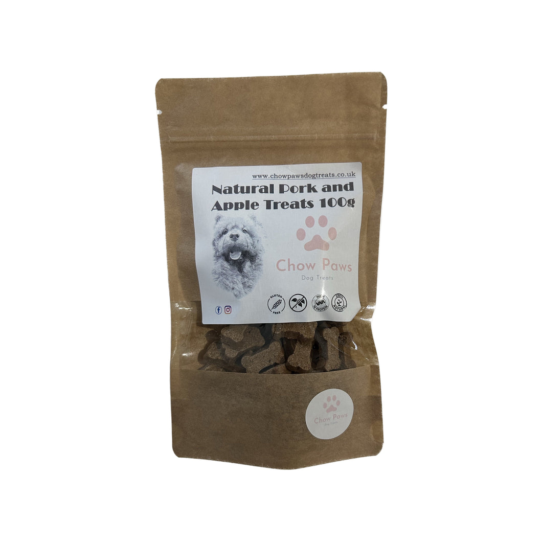 Bag of natural pork and apple treats for dogs with a visible label on a white background