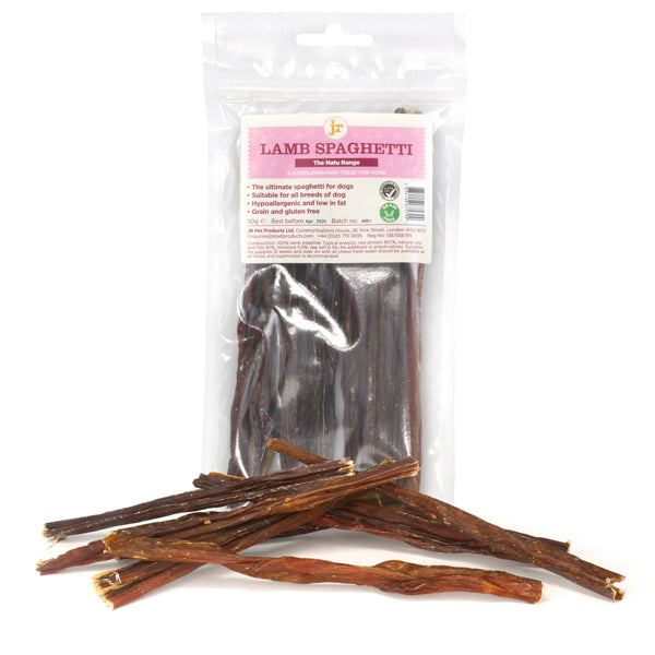 Packaged JR Lamb Spaghetti dog treats displayed with several individual treats outside the packaging to showcase the product.