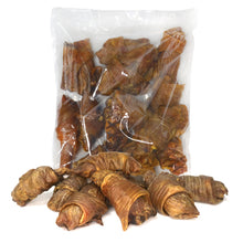 Load image into Gallery viewer, A clear plastic bag filled with dried curled insect larvae or pupae, with several pieces spilled in front on a plain white background.
