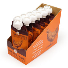 Load image into Gallery viewer, A retail display box filled with multiple orange and brown pouches of chicken paste pet food, photographed on a clean white background.
