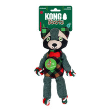 Load image into Gallery viewer, KONG Naturals plush raccoon dog toy in its green retail packaging, featuring a knitted raccoon in a red and green plaid outfit with a red bow tie.
