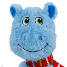 Load image into Gallery viewer, A close-up of a blue plush hippo toy with large green-rimmed eyes, a stitched smile, and a red patterned scarf, shown against a plain white background.
