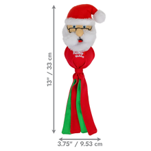 Load image into Gallery viewer, A Christmas-themed dog toy shaped like Santa's face and hat, with a red Santa hat and beard, black glasses, and a red body with green and red tails. The image includes dimension lines showing the height as 13 inches (33 cm) and the width as 3.
