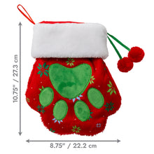 Load image into Gallery viewer, Red Christmas stocking with green paw print design and dimensions on a white background
