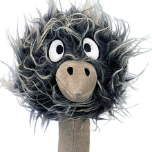 Load image into Gallery viewer, A plush ostrich toy with black and gray shaggy feathers, large white embroidered eyes, a beige snout, and a beige neck, isolated on a white background.
