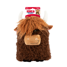 Load image into Gallery viewer, Kong Jumbo Highland Cow plush toy with brown shaggy fur, white horns, and a tan snout, shown with its retail hanging card on a white background.
