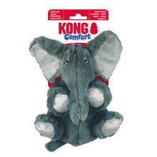 Load image into Gallery viewer, Kong Comfort plush elephant dog toy in gray with a red harness, attached to its original retail packaging header card on a white background.
