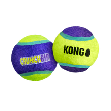Load image into Gallery viewer, Two KONG CrunchAir Balls, one purple and one yellow, with the brand name visible on them.
