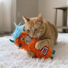 Load image into Gallery viewer, Cat playing with an orange plush toy on a white surface
