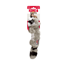 Load image into Gallery viewer, Kong Raccoon Kongs plush dog toy hanging from its retail packaging, featuring a gray and black raccoon design on a white background.
