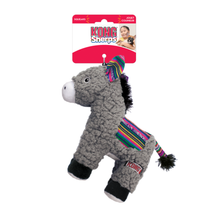 Load image into Gallery viewer, Kong Sheep plush dog toy in gray with a colorful striped blanket and tail, hanging from its original retail card packaging on a white background.
