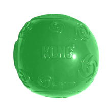 Load image into Gallery viewer, A bright green rubber dog toy ball with embossed swirl patterns and the brand name KONG on the front, isolated on a white background.
