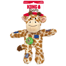 Load image into Gallery viewer, Kong Knobs plush giraffe squeaker toy in its original retail packaging, featuring a brown and cream patterned body with blue patch accents and a red hat.
