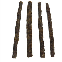 Load image into Gallery viewer, Four brown Lamb Jerky Stick dog chew sticks on a white background
