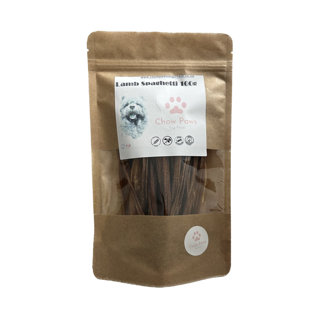 Brown package of dog treats with a label on a white background