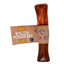 Load image into Gallery viewer, A Nova Dot Club Bacon Wonder Bar dog chew toy, size L, featuring a translucent amber-brown handle with glitter and a tan paper band label wrapped around the middle.
