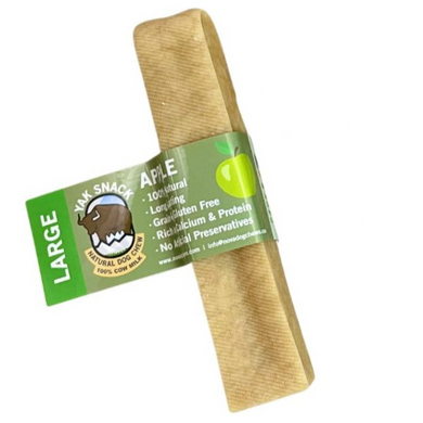 Packaging of a large yak cheese dog snack with apple flavor, displaying product information and branding.
