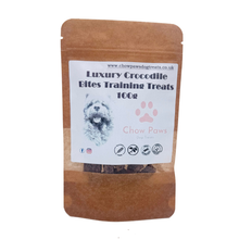 Load image into Gallery viewer, Package of Luxury Crocodile Bites Training Treats for dogs with a white label on a brown background
